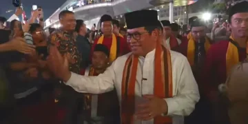 Momen Pramono dan Rano Diiringi Tanjidor pada Puncak HUT Jakarta