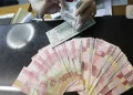 Rupiah Tertekan terhadap Dolar AS Akibat Tarif Impor Trump Hari Ini