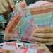 Rupiah Melewati 18000 per Dolar AS, BI Tingkatkan Intervensi Pasar Valas