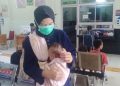 Tangis Sedih Bayi Aisya Berebut Udara Segar di Tengah Asap Pekat Palembang